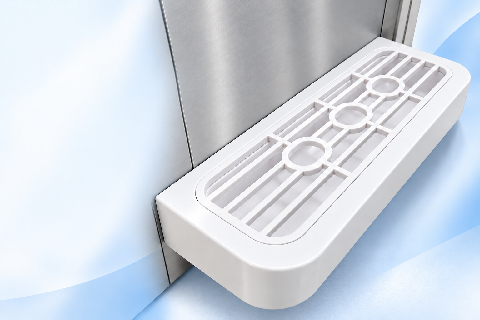 Attached white drip tray with three circular openings and the original grille.