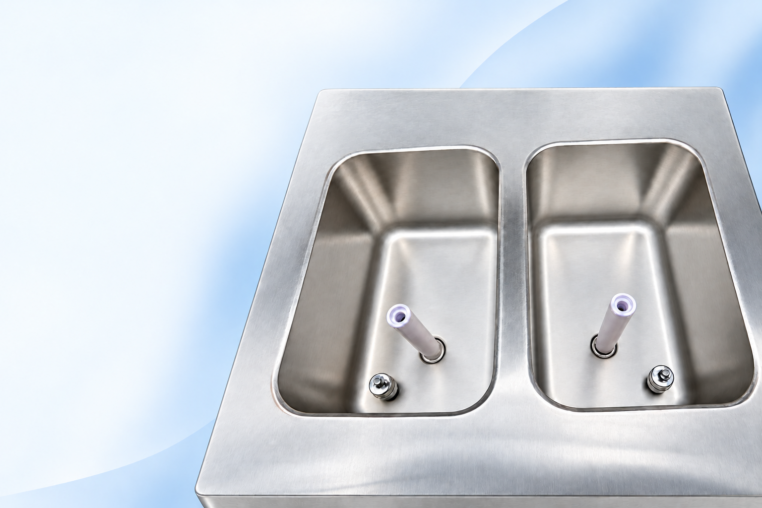 Two stainless steel mix hoppers with their actual internal fittings.