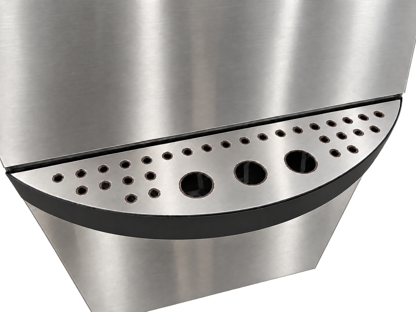 Curved perforated drip tray and its black front edge.